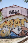 Facade of Casa das Rendeiras with fish and fisherman graffiti on the wall - Parnaiba city - Piaui state (PI) - Brazil