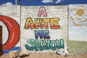 Colored street art (graffiti) on written wall (A Arte Me Salvou) - Cajueiro da Praia city - Piaui state (PI) - Brazil