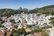 Picture taken with drone of residential buildings with Sugarloaf Mountain in the background - Rio de Janeiro city - Rio de Janeiro state (RJ) - Brazil
