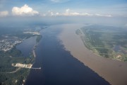 Aerial view of meeting of the waters of Negro River and Solimoes River  - Manaus city - Amazonas state (AM) - Brazil