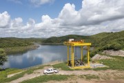 Workers from the consortium operator of the north axis of the Sao Francisco River Transposition doing maintenance on the Atalho reservoir - Project of Integration of Sao Francisco River with the watersheds of Northeast setentrional - Brejo Santo city - Ceara state (CE) - Brazil