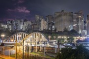 View of Santa Tereza Viaduct (1929) at night with buildings from the city center of Belo Horizonte in the background  - Belo Horizonte city - Minas Gerais state (MG) - Brazil