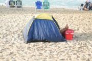 Camping tent at Arpoador Beach after New Years Eve 2023 - Rio de Janeiro city - Rio de Janeiro state (RJ) - Brazil