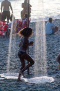 Girl taking a shower at Arpoador beach - Rio de Janeiro city - Rio de Janeiro state (RJ) - Brazil