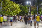 People and tourists walking on the edge of Beira Mar Avenue at night - Fortaleza city - Ceara state (CE) - Brazil
