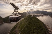 Cable car making the crossing between the Urca Mountain and Sugarloaf during the sunset - Rio de Janeiro city - Rio de Janeiro state (RJ) - Brazil