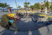 Skateboarder maneuvering on the skatepark on the edge of Nautico Beach - Fortaleza city - Ceara state (CE) - Brazil