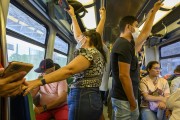 Passengers wearing a mask in a subway car on the Southern line during rush hour - Fortaleza city - Ceara state (CE) - Brazil