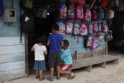 Children at the door of a store in the city of Atalaia do Norte - Atalaia do Norte city - Amazonas state (AM) - Brazil