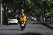 Postal biker delivering parcels - Rio de Janeiro city - Rio de Janeiro state (RJ) - Brazil
