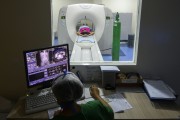 Patient in computed tomography room at Leonardo da Vinci State Hospital - Fortaleza city - Ceara state (CE) - Brazil
