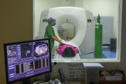 Nursing assistant preparing patient in computed tomography room at Leonardo da Vinci State Hospital - Fortaleza city - Ceara state (CE) - Brazil
