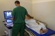 Patient doing echocardiogram at Leonardo da Vinci State Hospital - Fortaleza city - Ceara state (CE) - Brazil