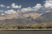 Arid and dry landscape with mountains of the Andes Mountains in the background - Mendoza - Mendoza Province - Argentina