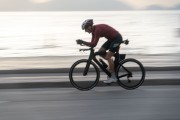 Cyclist on Atlantic Avenue at dawn - Rio de Janeiro city - Rio de Janeiro state (RJ) - Brazil
