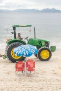 Gari from COMLURB (urban cleaning company of Rio de Janeiro city) using a tractor to clean Copacabana Beach - Rio de Janeiro city - Rio de Janeiro state (RJ) - Brazil