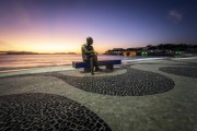View of the statue of poet Carlos Drummond de Andrade on Post 6 during the dawn - Rio de Janeiro city - Rio de Janeiro state (RJ) - Brazil