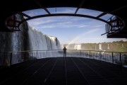 Tourist near the waterfalls in Iguaçu National Park - Foz do Iguacu city - Parana state (PR) - Brazil