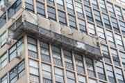 Scaffolding used in the maintenance of the facade of a building on Atlantica Avenue - Rio de Janeiro city - Rio de Janeiro state (RJ) - Brazil