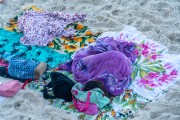 Person sleeping on the sand of Arpoador Beach - Rio de Janeiro city - Rio de Janeiro state (RJ) - Brazil
