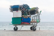 Detail of cargo trolley - man carrying a cart - with beach chairs - Ipanema Beach waterfront - Rio de Janeiro city - Rio de Janeiro state (RJ) - Brazil