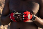 Detail of a man with a glove using a cell phone - Arpoador - Rio de Janeiro city - Rio de Janeiro state (RJ) - Brazil