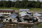 Floating houses in the community of Catalao Lake during the dry season in the Amazon rivers - Careiro da Varzea city - Amazonas state (AM) - Brazil