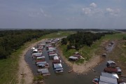 Picture taken with drone of floating houses in the community of Catalao Lake during the dry season in the Amazon rivers - Careiro da Varzea city - Amazonas state (AM) - Brazil