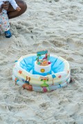 Childrens birthday cake inside an inflatable pool - Copacabana Beach - Rio de Janeiro city - Rio de Janeiro state (RJ) - Brazil