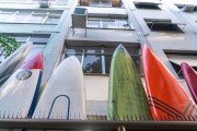 Detail of surf and stand up boards and building facade - Joaquim Nabuco Street - Rio de Janeiro city - Rio de Janeiro state (RJ) - Brazil