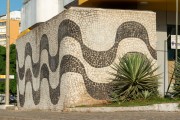 Portuguese stone wall in a gas station with a traditional wave design of the Copacabana boardwalk - Rio de Janeiro city - Rio de Janeiro state (RJ) - Brazil