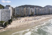 Picture taken with drone of the Pitangueiras Beach with Sobre as Ondas Building on the left - Guaruja city - Sao Paulo state (SP) - Brazil