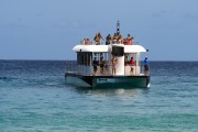 Boat with tourists at Sancho Beach - Fernando de Noronha Marine National Park - Fernando de Noronha city - Pernambuco state (PE) - Brazil