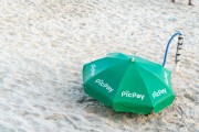 Sun umbrella protecting a water pump on Ipanema Beach - Rio de Janeiro city - Rio de Janeiro state (RJ) - Brazil