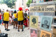 Sale of Cordel Literature - during Fogo e Paixao carnival street troup parade  - Rio de Janeiro city - Rio de Janeiro state (RJ) - Brazil