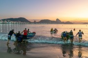 Festive dawn, boats leaving the sea in the celebration of the centenary of the Fishing village Z-13 - on Post 6 of Copacabana Beach - Rio de Janeiro city - Rio de Janeiro state (RJ) - Brazil