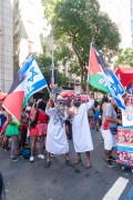 Revelers with flags asking for PEACE between Israel and Palestine during Cordao da Bola Preta carnival street troup parade  - Rio de Janeiro city - Rio de Janeiro state (RJ) - Brazil