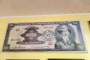 Image of Santos Dumont on a Mil Cruzeiros Novos banknote decorating a restaurant on the BR-040 highway - Santos Dumont city - Minas Gerais state (MG) - Brazil