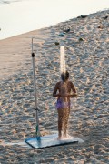 Boy taking a shower at Ipanema Beach - Rio de Janeiro city - Rio de Janeiro state (RJ) - Brazil