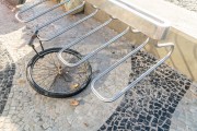 Wheel with lock from bicycle stolen while it was attached to a bicycle rack - Bicycle rack at Posto 6 on Copacabana Beach - Rio de Janeiro city - Rio de Janeiro state (RJ) - Brazil