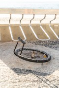 Wheel with lock from bicycle stolen while it was attached to a bicycle rack - Bicycle rack at Posto 6 on Copacabana Beach - Rio de Janeiro city - Rio de Janeiro state (RJ) - Brazil