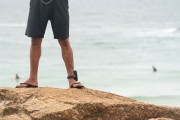 Detail of man wearing electronic ankle bracelet - Arpoador Beach - Rio de Janeiro city - Rio de Janeiro state (RJ) - Brazil