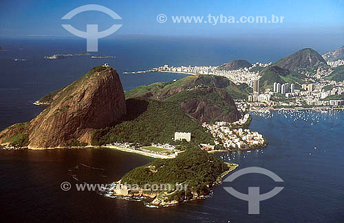  Vista aérea do Pão de Açúcar (1). à direita, uma área pertencente ao Exército Brasileiro, Urca e a Enseada de Botafogo; Copacabana ao fundo - Rio de Janeiro - RJ - Brasil

(1) É comum chamarmos de Pão de Açúcar, o conjunto da formação rochosa que inclui o Morro da Urca e o próprio Morro do Pão de Açúcar (o mais alto dos dois). O conjunto rochoso é Patrimônio Histórico Nacional desde 08-08-1973.

  - Rio de Janeiro - Rio de Janeiro - Brasil