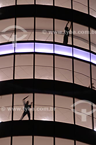  Workers` silhouette working at a glass facade building - City Center of Rio de Janeiro city - Rio de Janeiro state - Brazil 