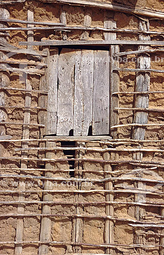  Architectural detail - wood window at a house made of wattle and daub - Brazil 