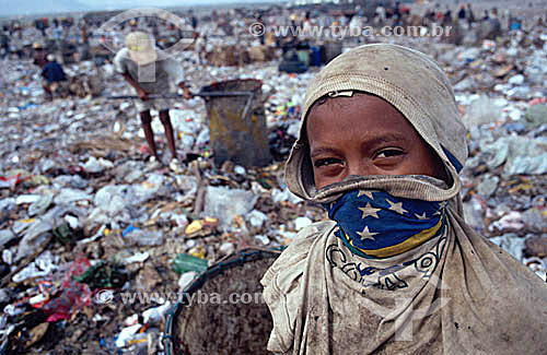  Garbage management - Landfill - Waste disposal - Children searching for food or something to make money in the trash 