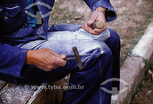  Wood Craftwork - Detail of the hands of a crafstman working on a wood sculpture - Brazil 