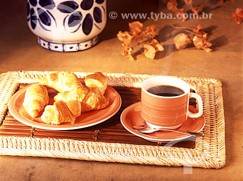  Breakfast with cup of coffee and croissants 