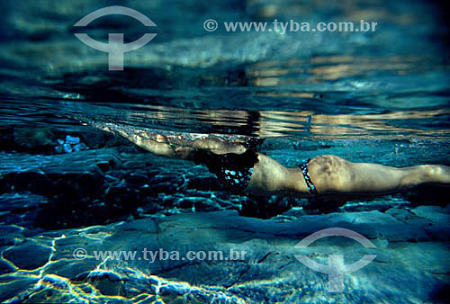  Woman swimming on the sea 