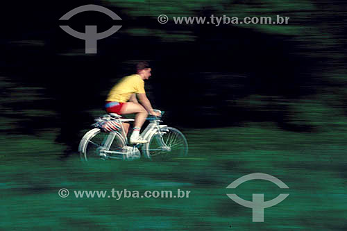  Man riding the bicycle at the park 